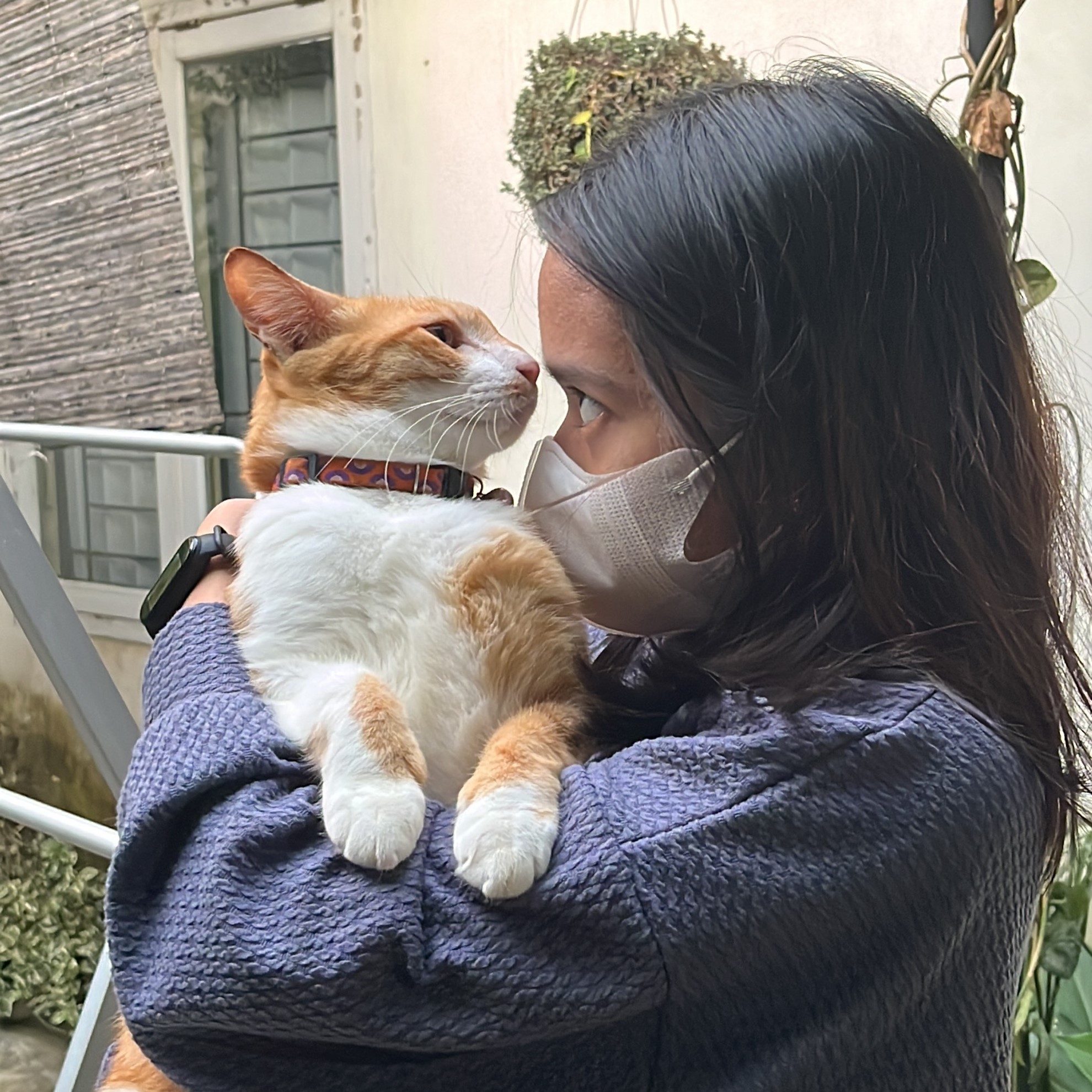 Oshin, in my arms, sharing a sweet kiss
